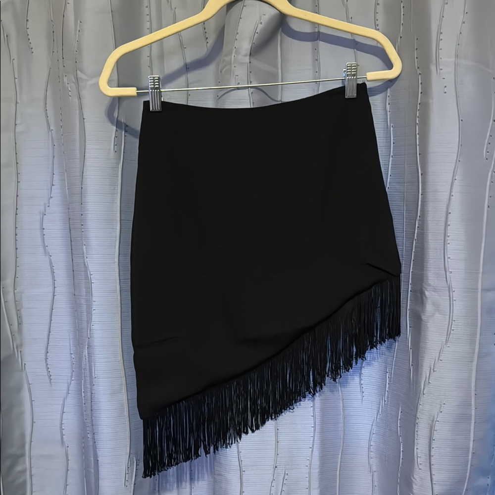 Asymmetrical fringe mini skirt